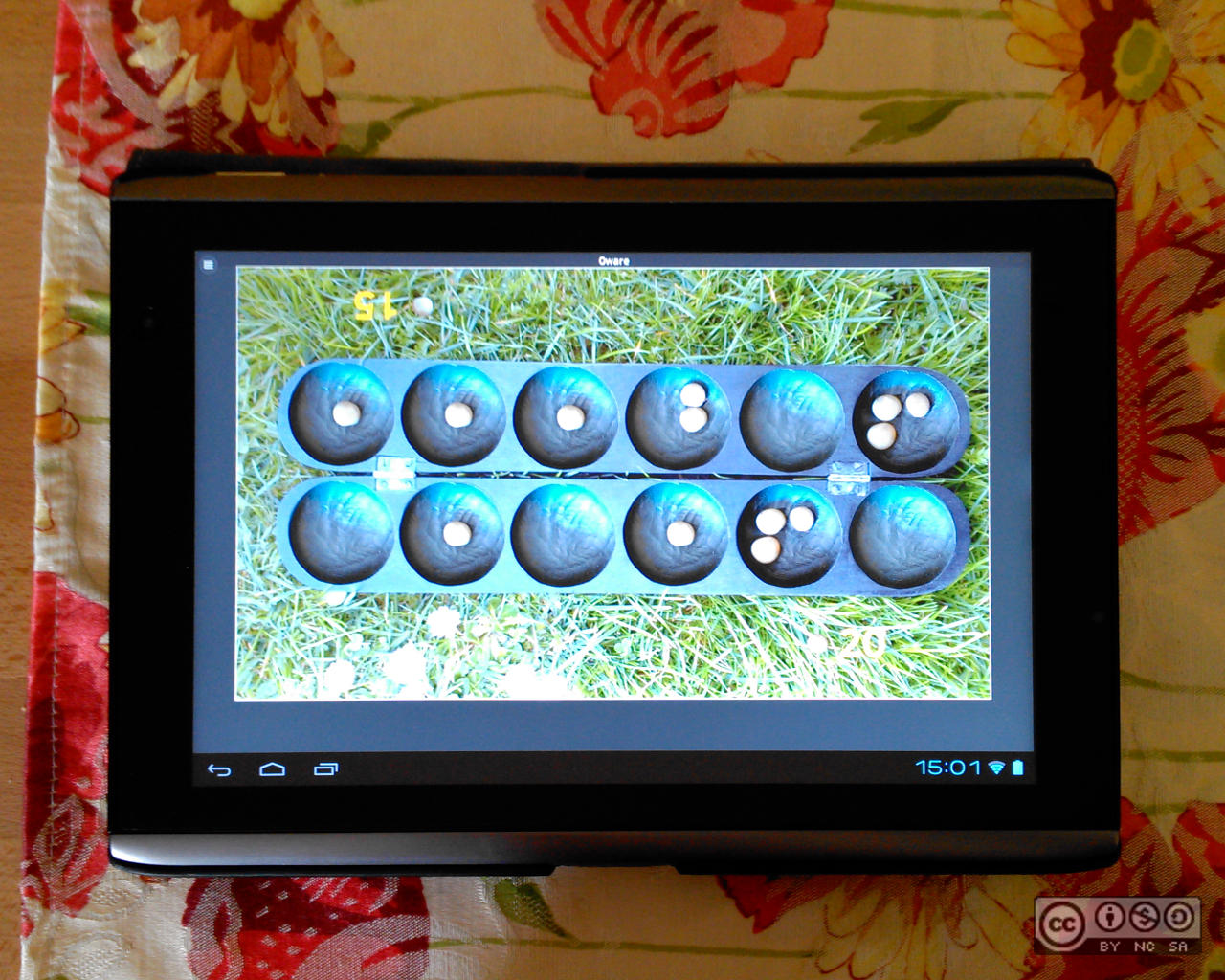 Playing Oware on Android tablet, own work, Oliver Merkel, Creative Commons License, This work is licensed under a Creative Commons Attribution-NonCommercial-ShareAlike 4.0 International License.