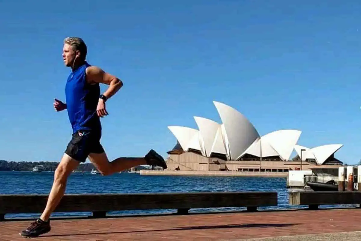 Bret McGowen running in front of the Sydney Opera House